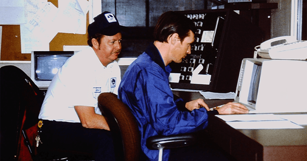 Ernesto sits at desk working on cormorant marketing's new website