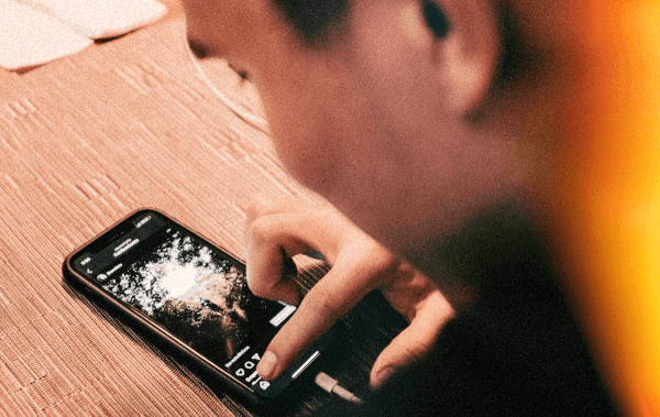 Vet social media in Jacksonville a man scrolls on veterinary clinic social media in Jacksonville fl