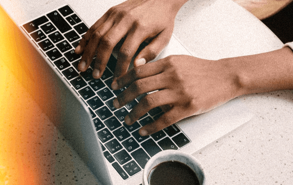 Veterinary blog in Jacksonville FL hands on keyboard representing blog writing services for veterinary clinics in Jacksonville fl